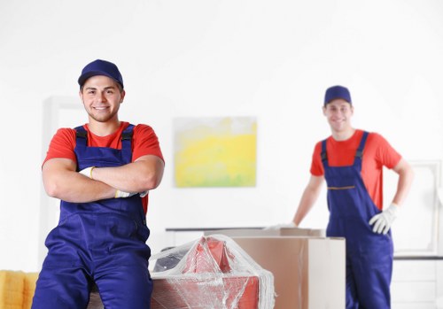 Professional removals in Bethnal Green with packed boxes and moving van