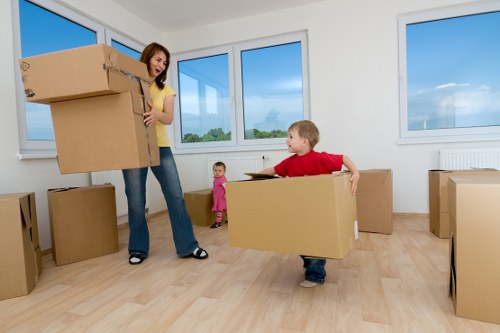 Man with van team preparing items safely for loading