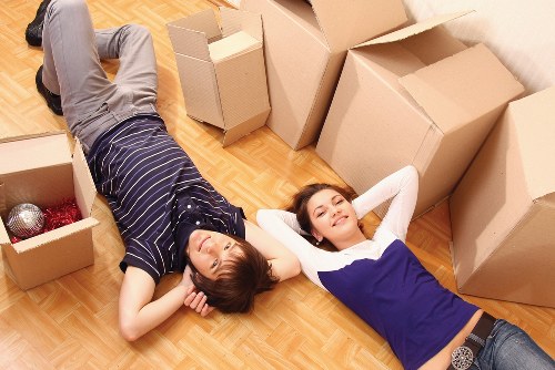Crew using proper lifting technique during a move