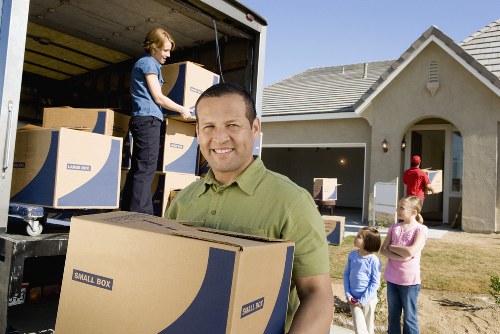 Careful loading of household items by a Bethnal Green van service