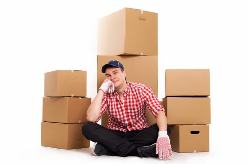Professional office removals team handling desks and equipment